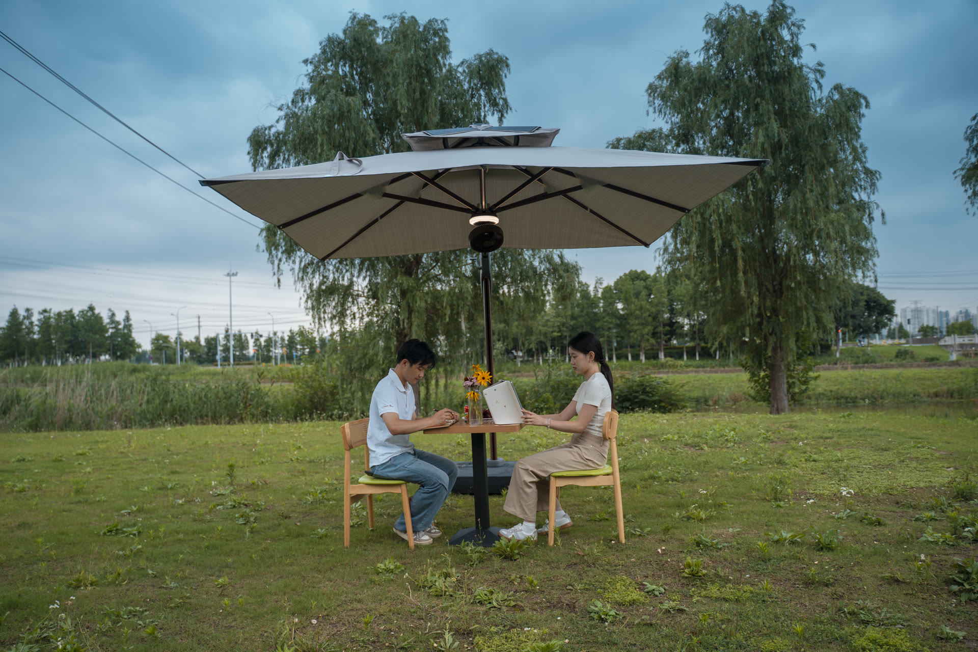 Solargy cantilever solar umbrella installed outdoors with a water-fillable base